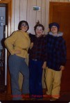 three children mummering in costume