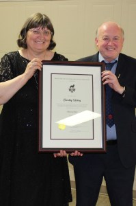 Dorothy Hickey accepting NL Soccer Award of Merin April 2019